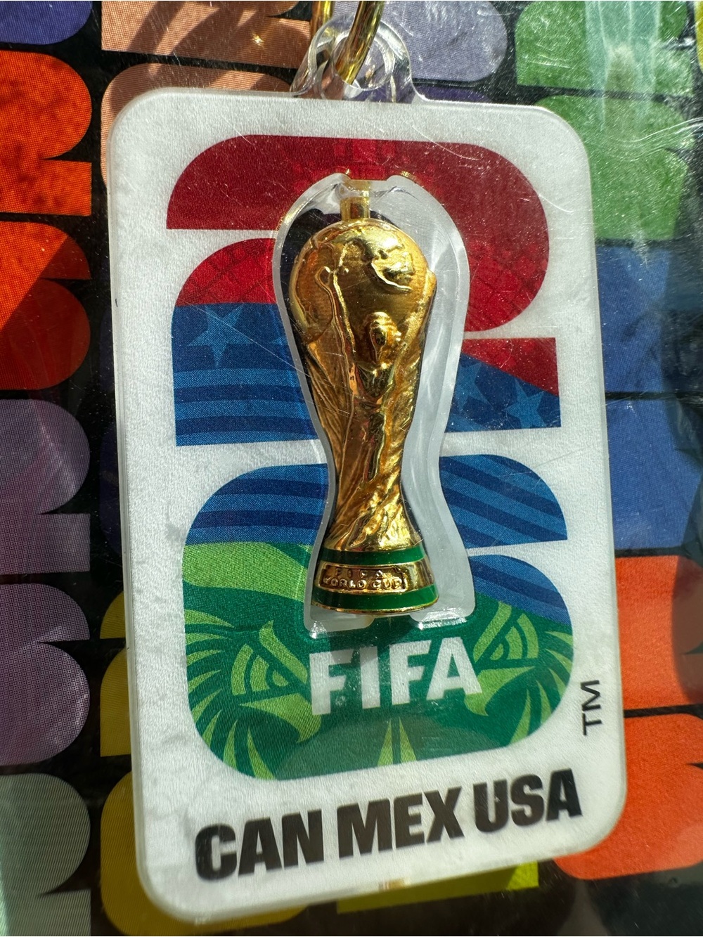 FIFA World Cup Gold Trophy Keyring — White, Gold, Green Accent
